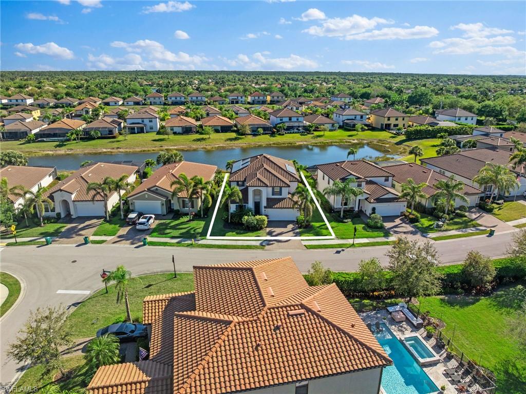 4764 Formosa Drive Naples, FL 34119 - Photo 27 of 32 an aerial view of a houses with outdoor space