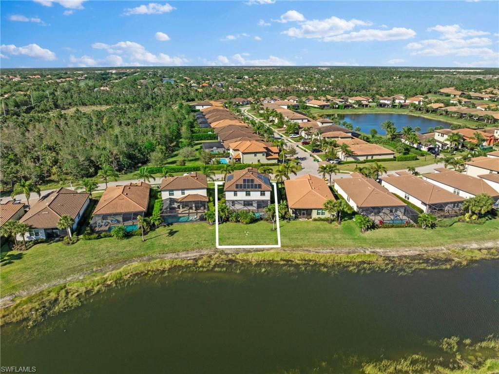 4764 Formosa Drive Naples, FL 34119 - Photo 30 of 32 an aerial view of residential houses with outdoor space and ocean view