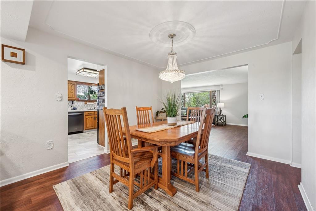 333 Malone Ridge Road Washington, PA 15301 - Photo 10 of 37 a view of a dining room with furniture window and wooden floor