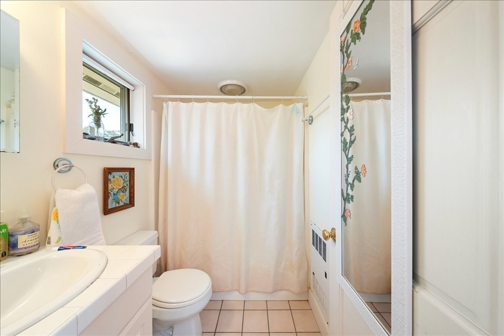 10 2nd Street Natick, MA 01760 - Photo 24 of 31 a bathroom with a sink toilet and shower
