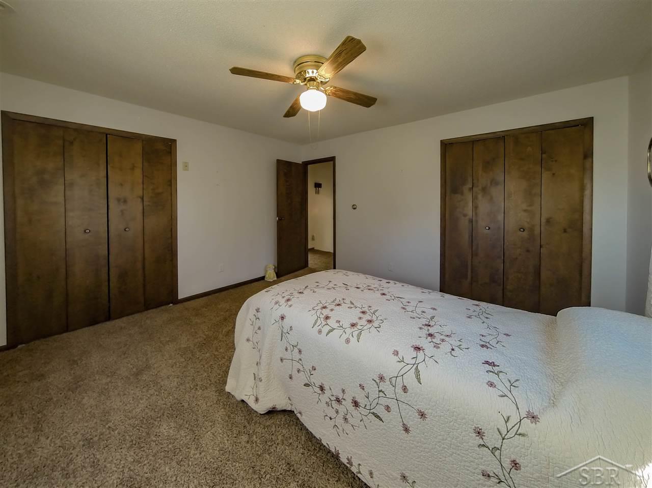 2366 West Wheeler Road Auburn, MI 48611 - Photo 8 of 15 Master Bed has two full closets. (His and Hers)