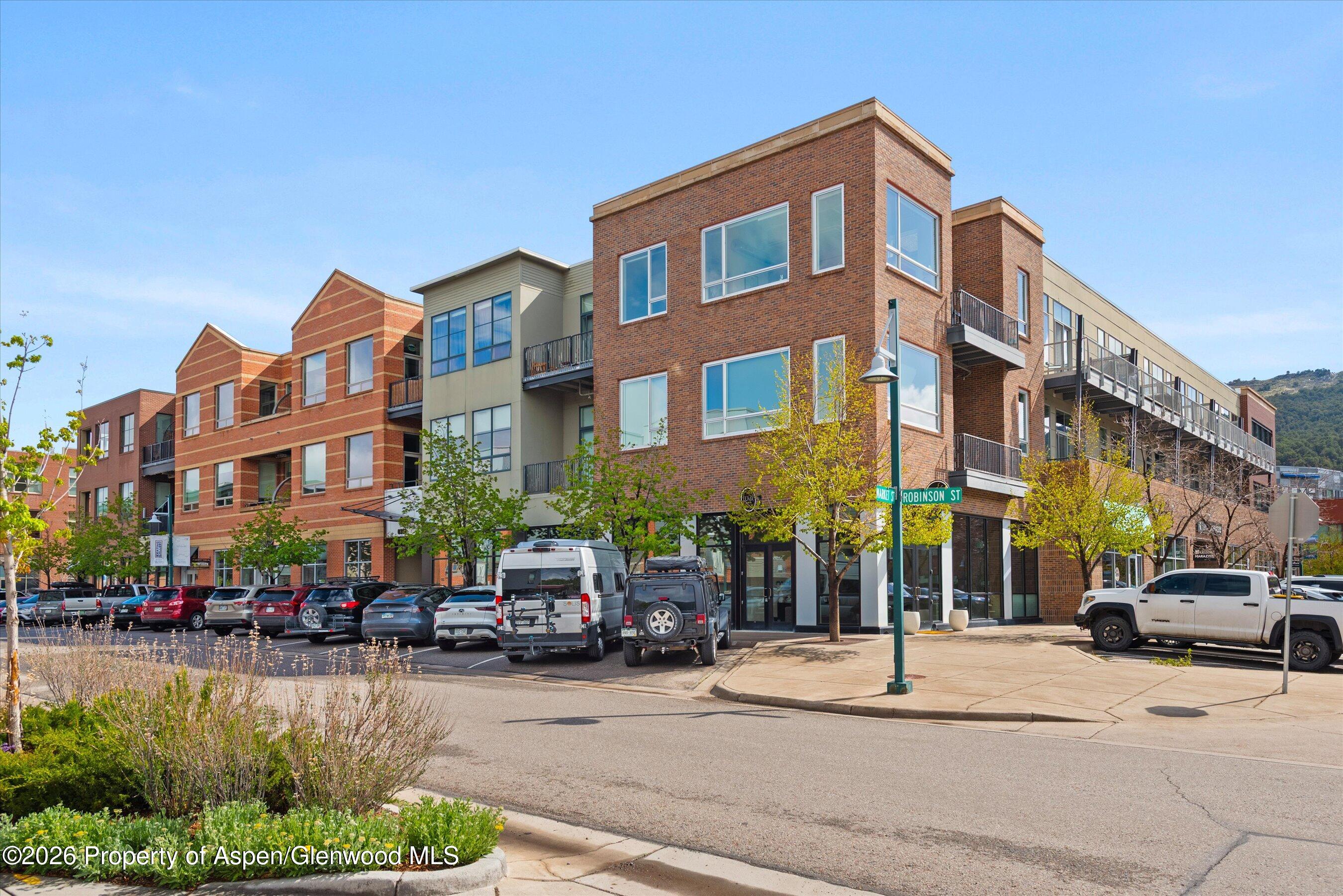 361 Robinson Street, Unit 240 Basalt, CO 81621 - Photo 1 of 11 a front view of a building with street view