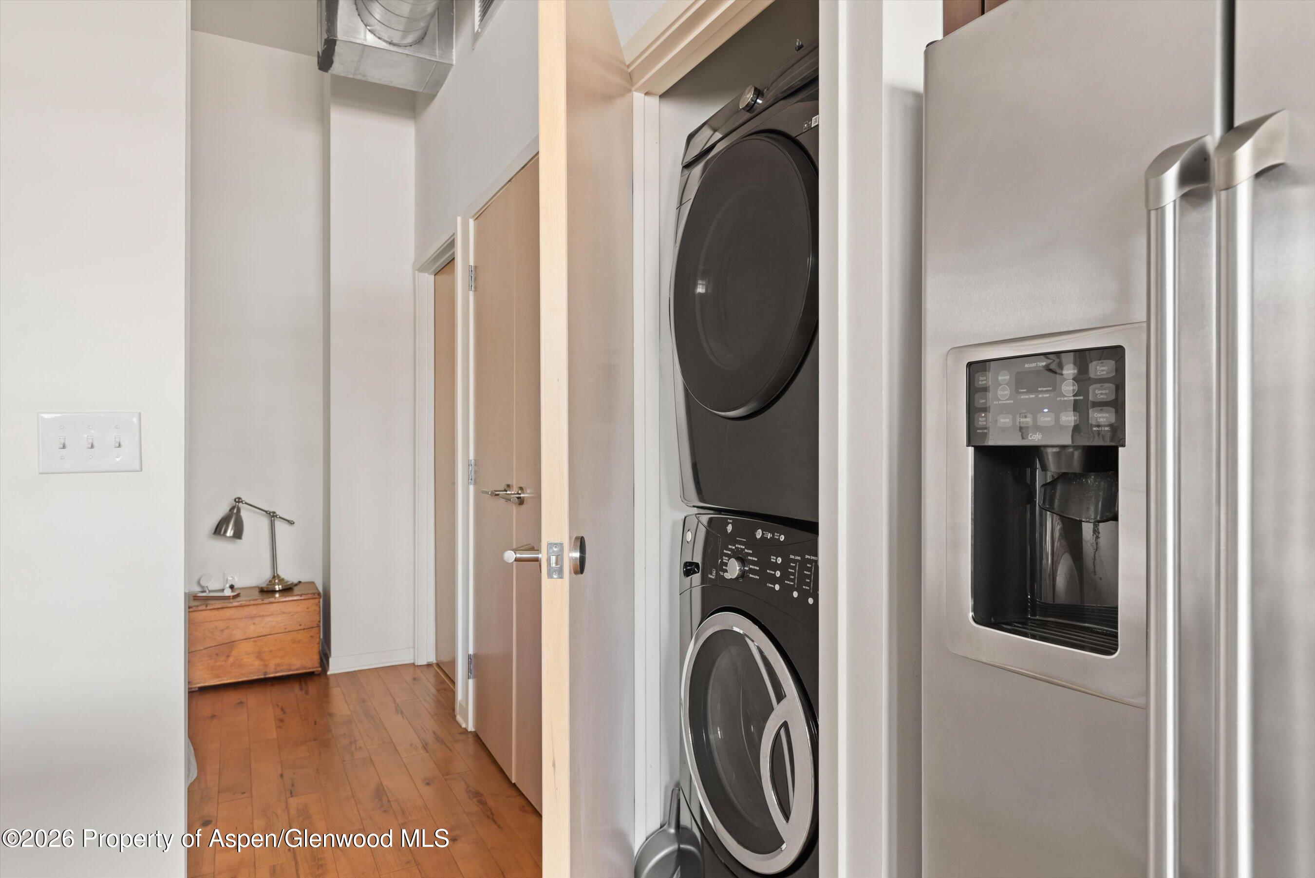 361 Robinson Street, Unit 240 Basalt, CO 81621 - Photo 8 of 11 a view of a hallway with washer and dryer
