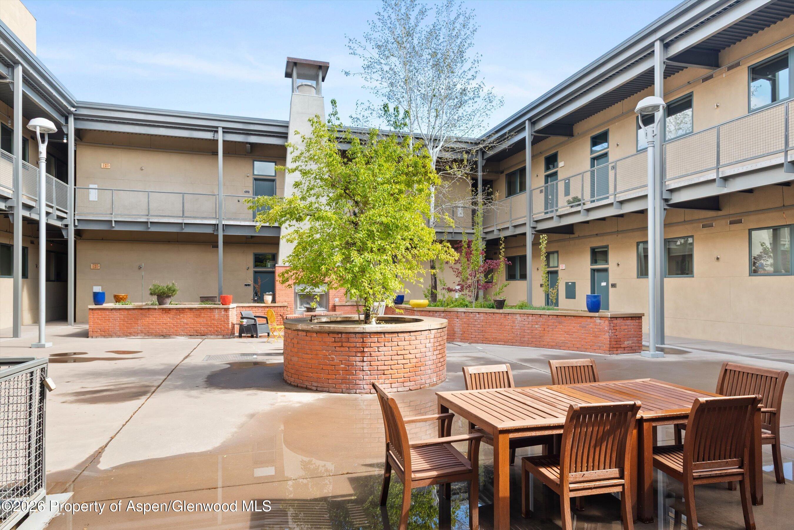 361 Robinson Street, Unit 240 Basalt, CO 81621 - Photo 9 of 11 a outdoor view of a house with sitting area