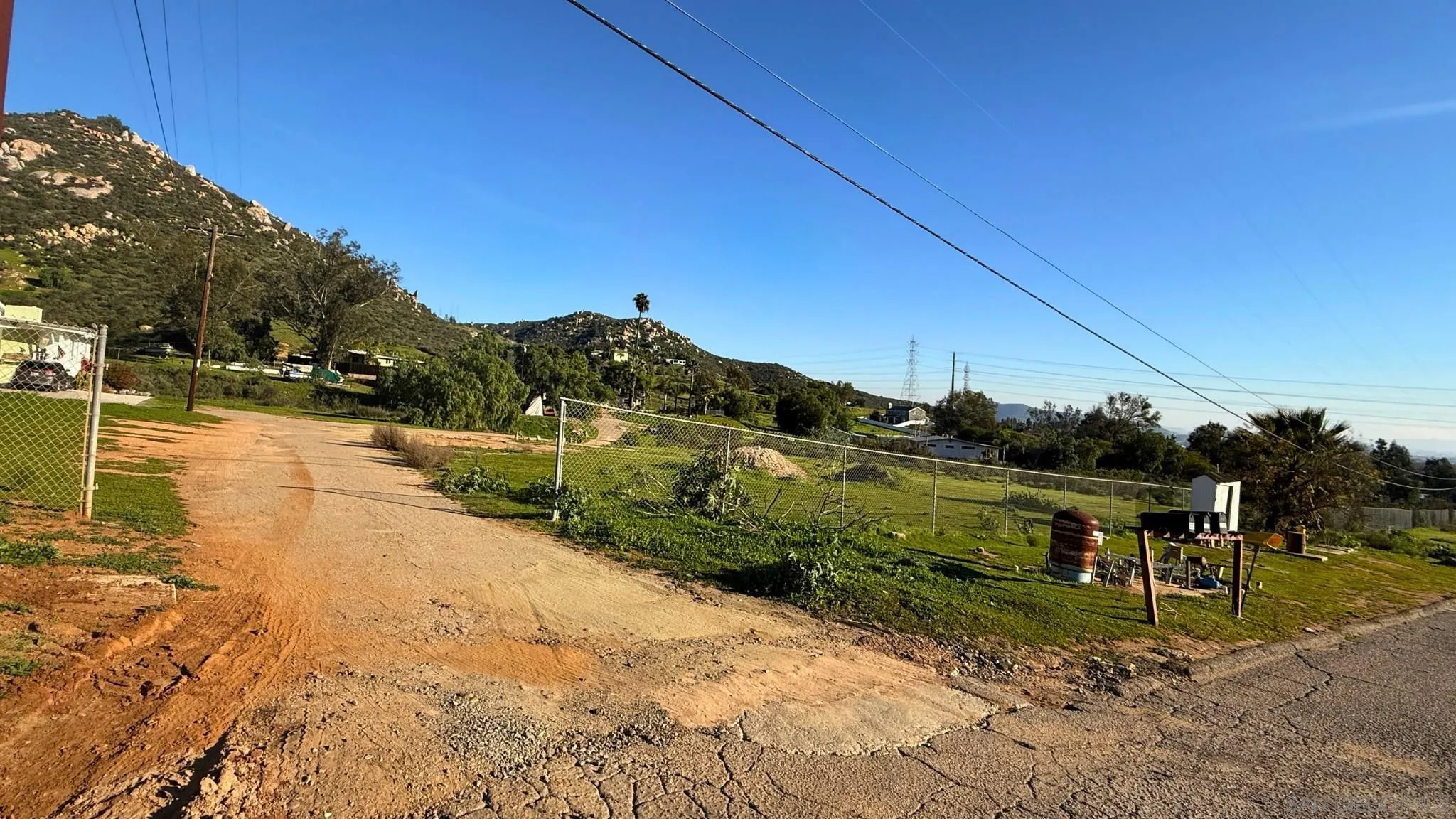 11041 Summit Avenue Santee, CA 92071 - Photo 7 of 7 a view of a road with a yard