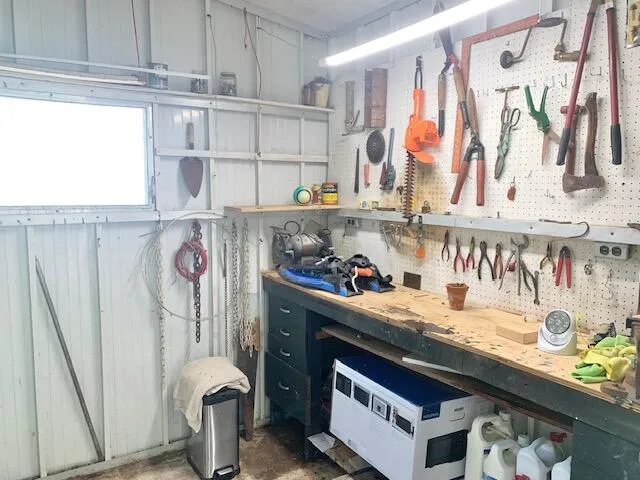 a kitchen with stainless steel appliances granite countertop a refrigerator and a stove