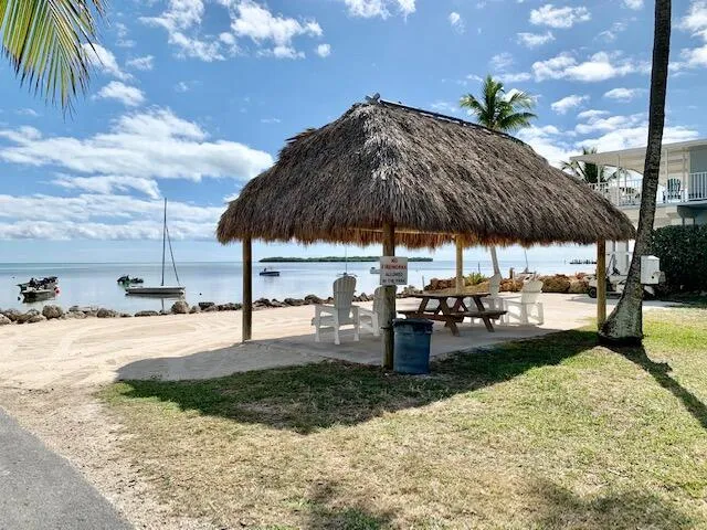 a view of a backyard with a patio