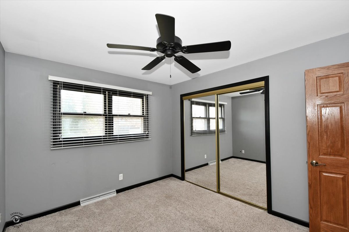 616 Northgate Road New Lenox, IL 60451 - Photo 26 of 34 an empty room with windows