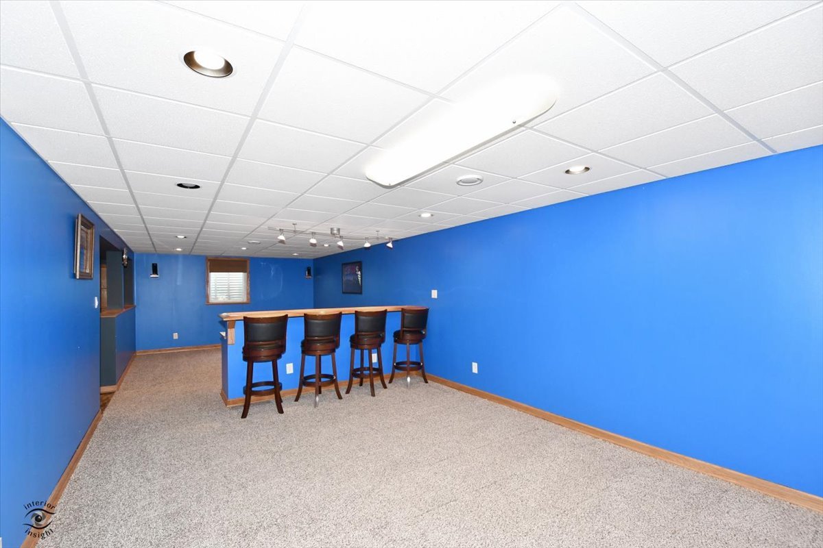 616 Northgate Road New Lenox, IL 60451 - Photo 27 of 34 a view of a room with a table and chairs
