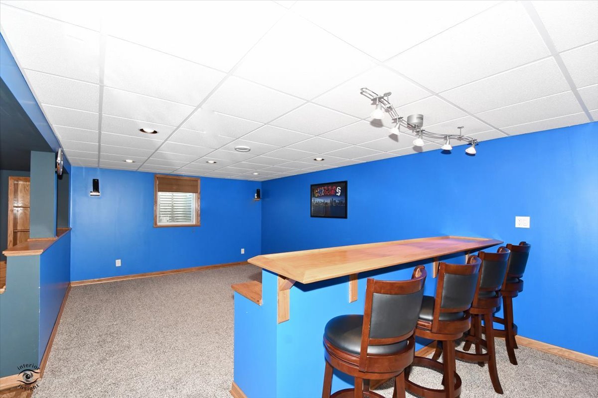 616 Northgate Road New Lenox, IL 60451 - Photo 29 of 34 a view of a dining room with furniture and wooden floor