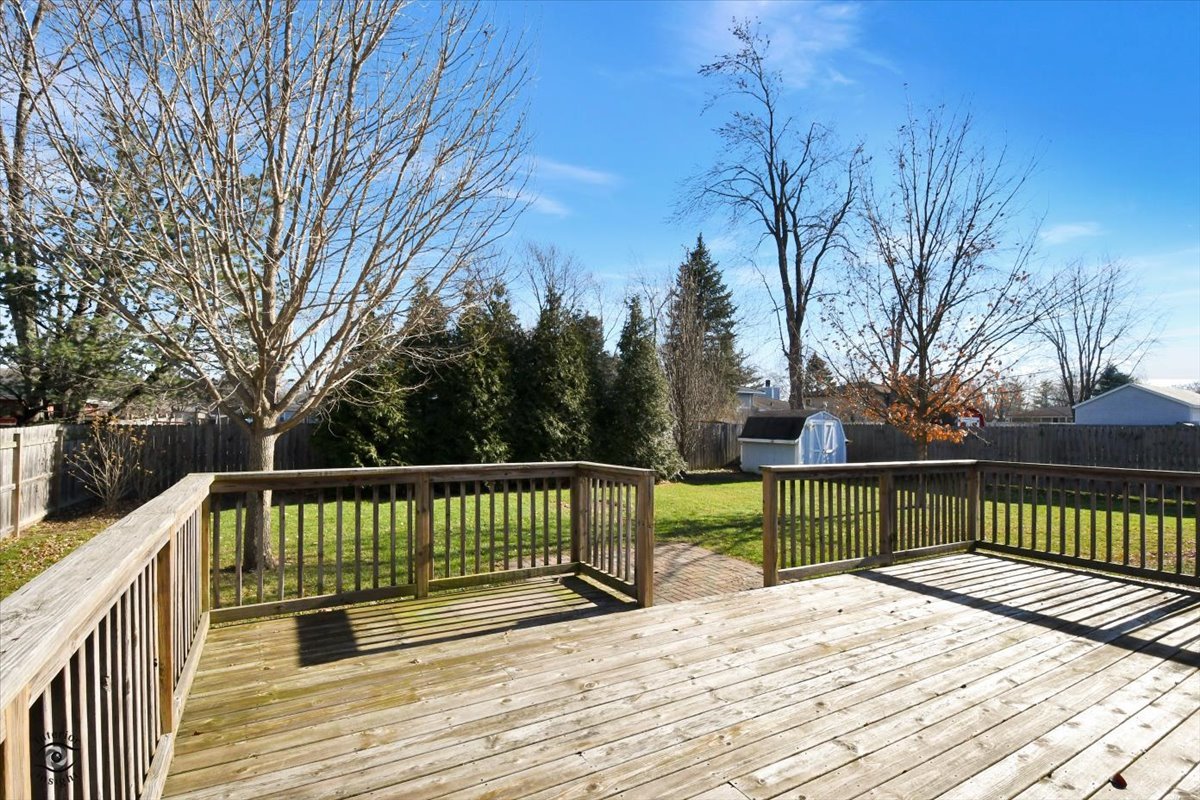 616 Northgate Road New Lenox, IL 60451 - Photo 4 of 34 a view of balcony with wooden floor and fence