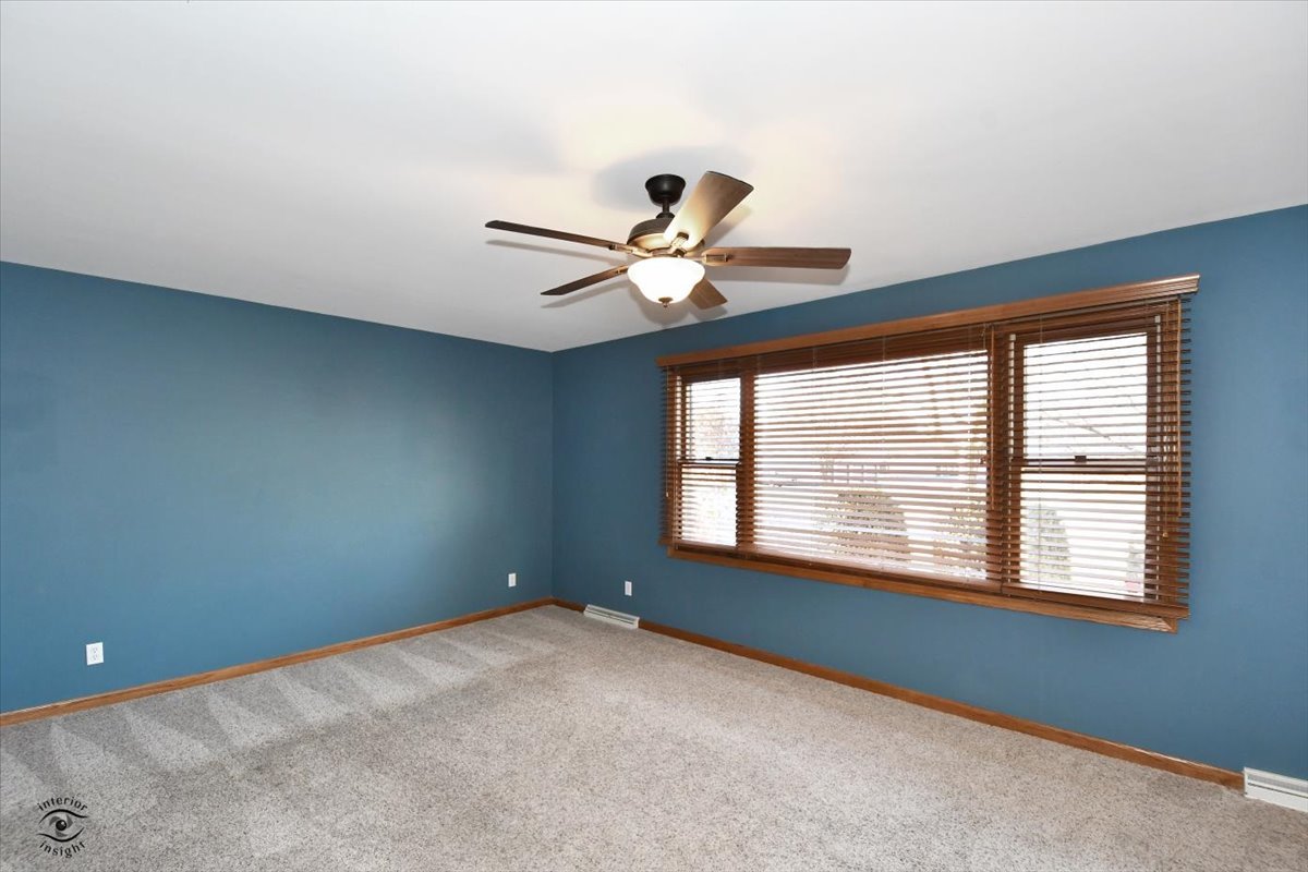 616 Northgate Road New Lenox, IL 60451 - Photo 9 of 34 a view of an empty room with a window