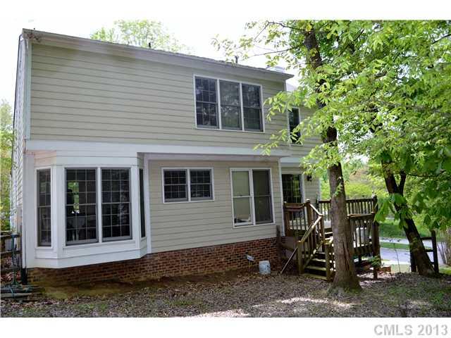 3830 Brownes Ferry Road Charlotte, NC 28269 - Photo 3 of 3 a view of house with backyard