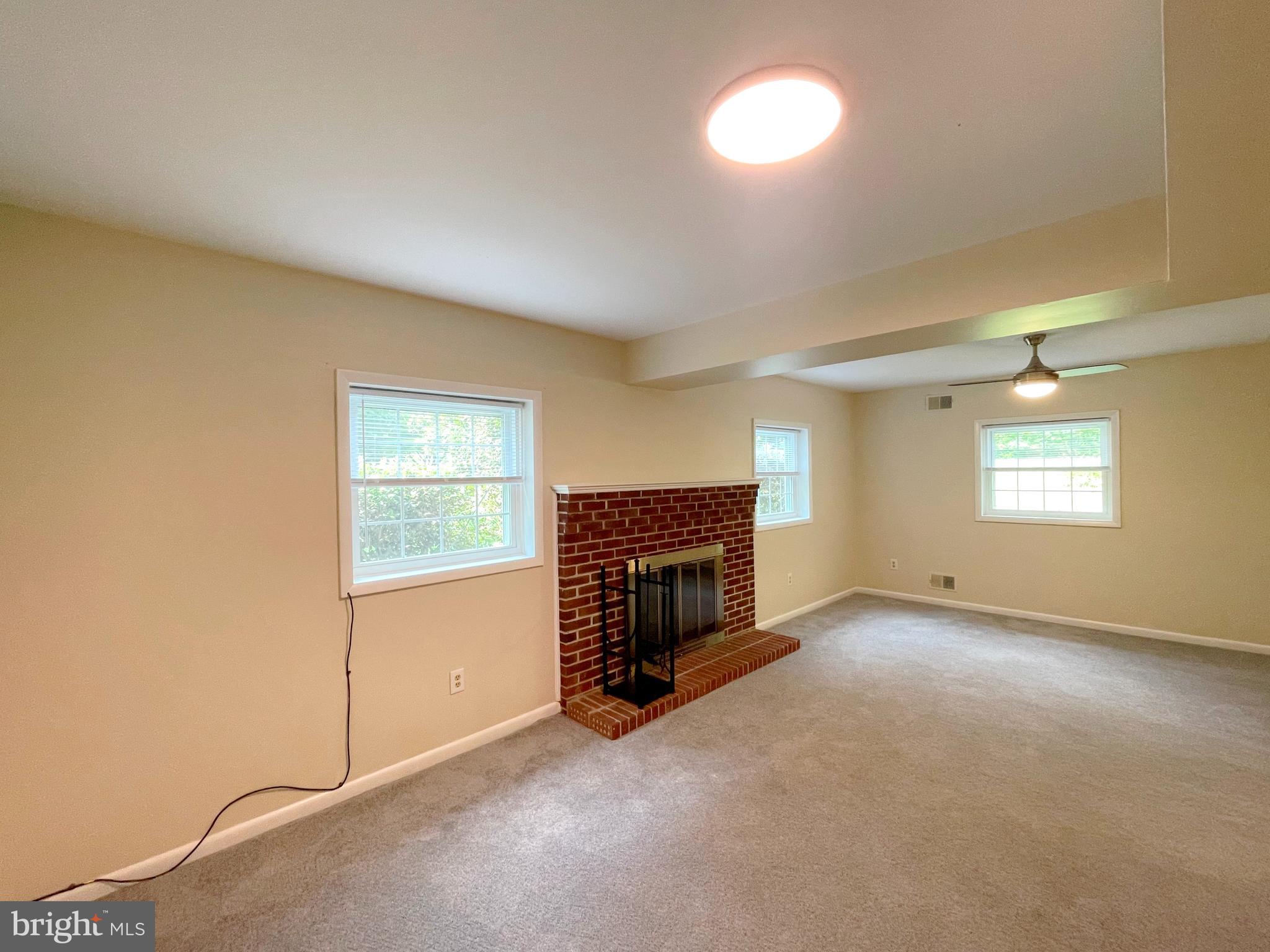40865 Spring House Lane Leonardtown, MD 20650 - Photo 19 of 33 Family room w/fireplace