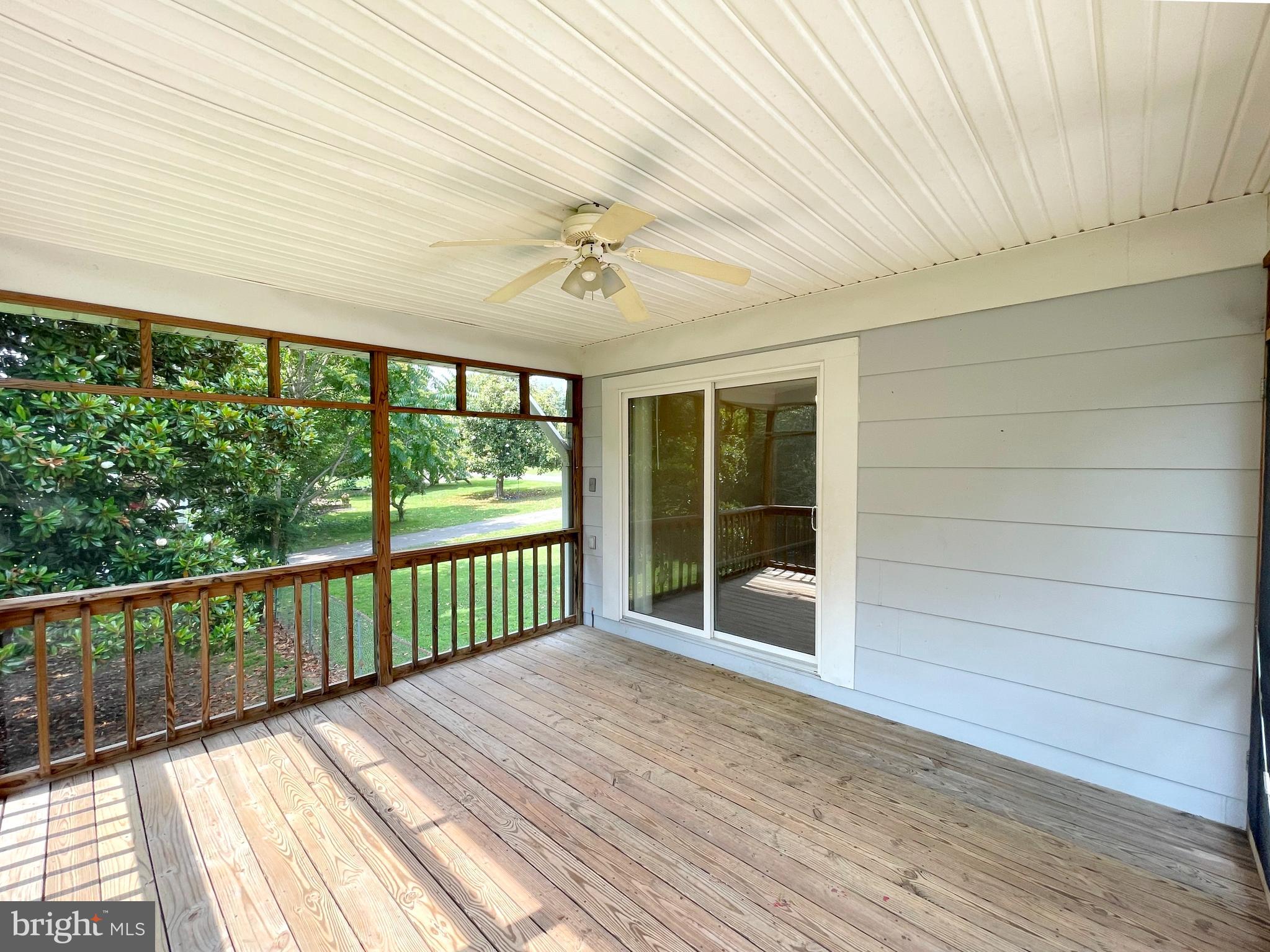 40865 Spring House Lane Leonardtown, MD 20650 - Photo 24 of 33 Rear screened deck off of Dining room