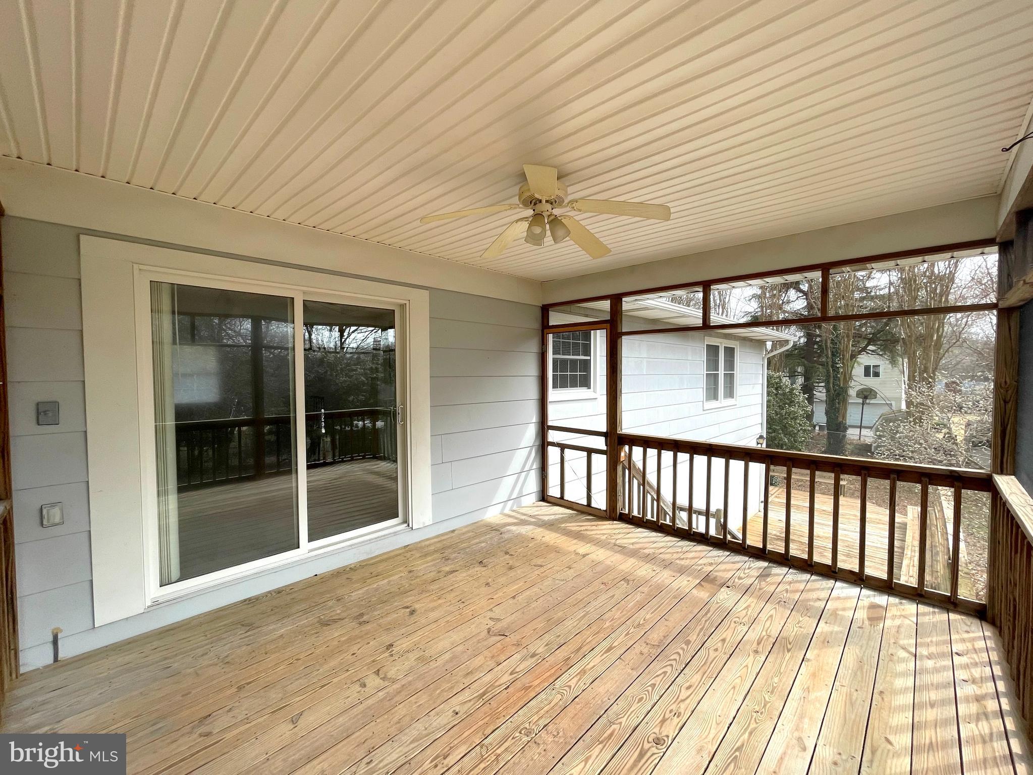40865 Spring House Lane Leonardtown, MD 20650 - Photo 25 of 33 Rear screened deck off of Dining room