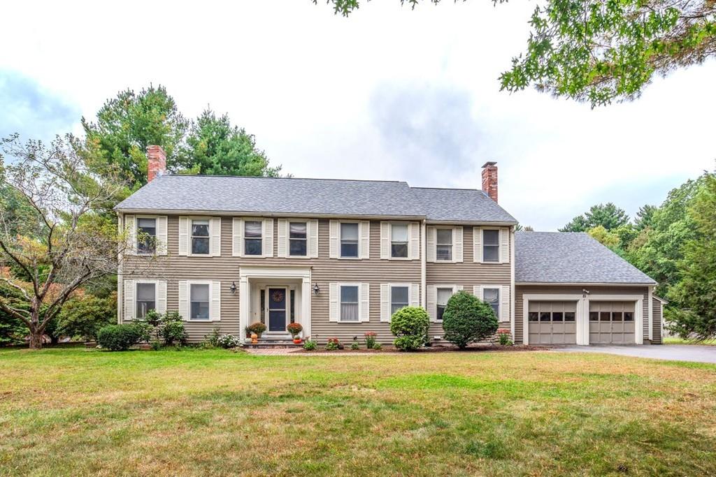 89 Shadow Oak Drive Sudbury, MA 01776 - Photo 1 of 31 a front view of a house with a garden