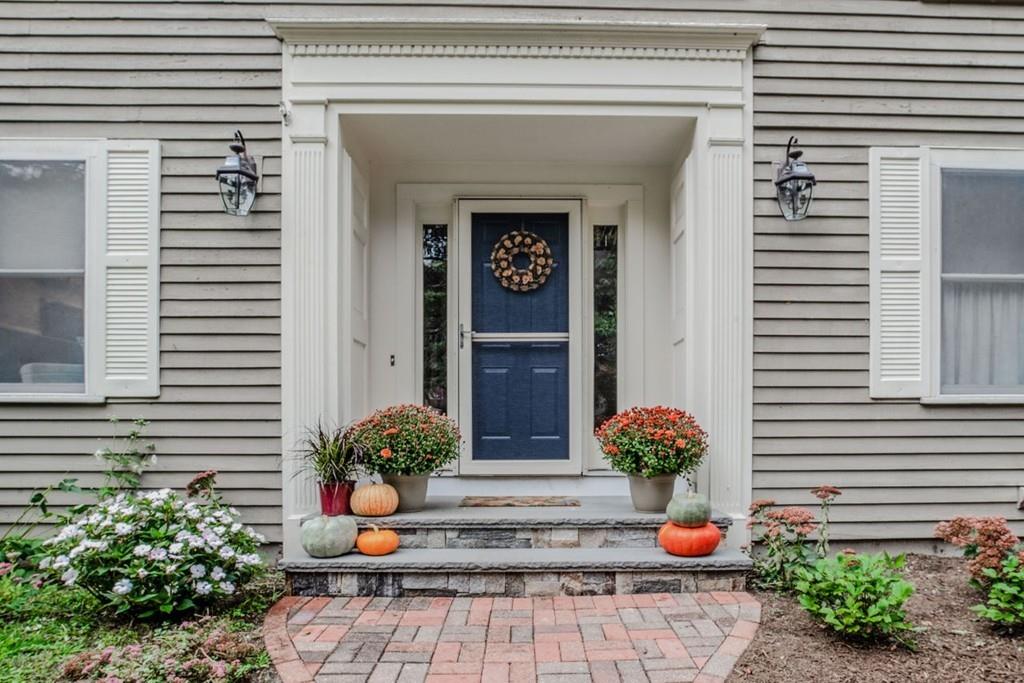89 Shadow Oak Drive Sudbury, MA 01776 - Photo 3 of 31 a front view of a house with potted plants