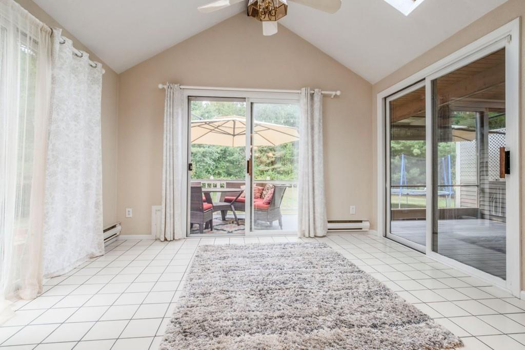 89 Shadow Oak Drive Sudbury, MA 01776 - Photo 10 of 31 a living room with a large window