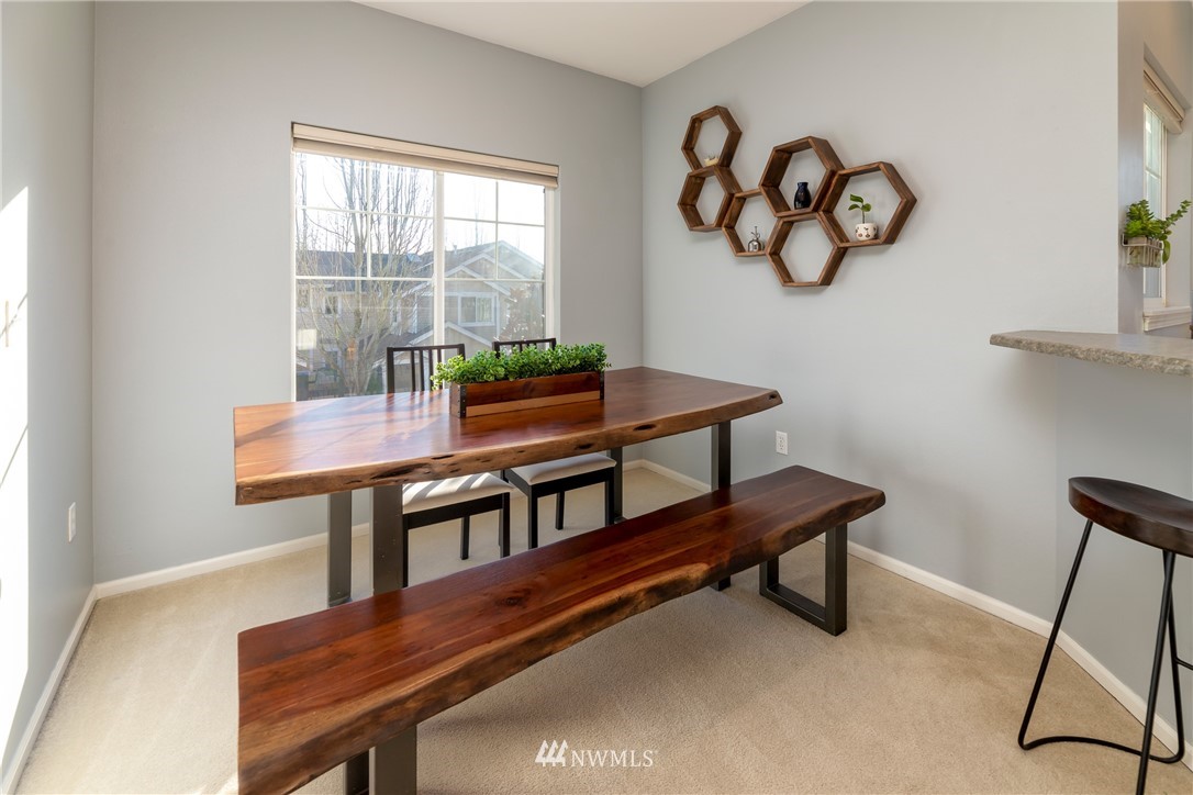 214 South 48th Street, Unit 45B Renton, WA 98055 - Photo 12 of 30 a living room with furniture and a window