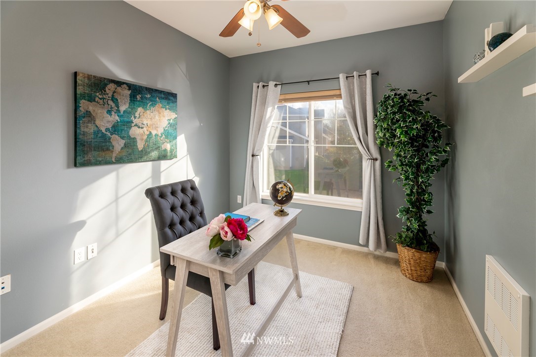214 South 48th Street, Unit 45B Renton, WA 98055 - Photo 19 of 30 a view of a livingroom with furniture window and outside view