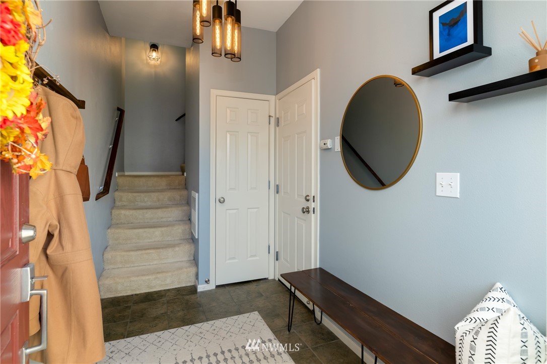 214 South 48th Street, Unit 45B Renton, WA 98055 - Photo 3 of 30 an entryway in a hall with wooden floor