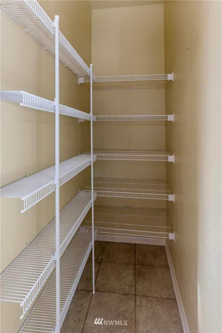 214 South 48th Street, Unit 45B Renton, WA 98055 - Photo 22 of 30 a view of walk in closet with empty racks