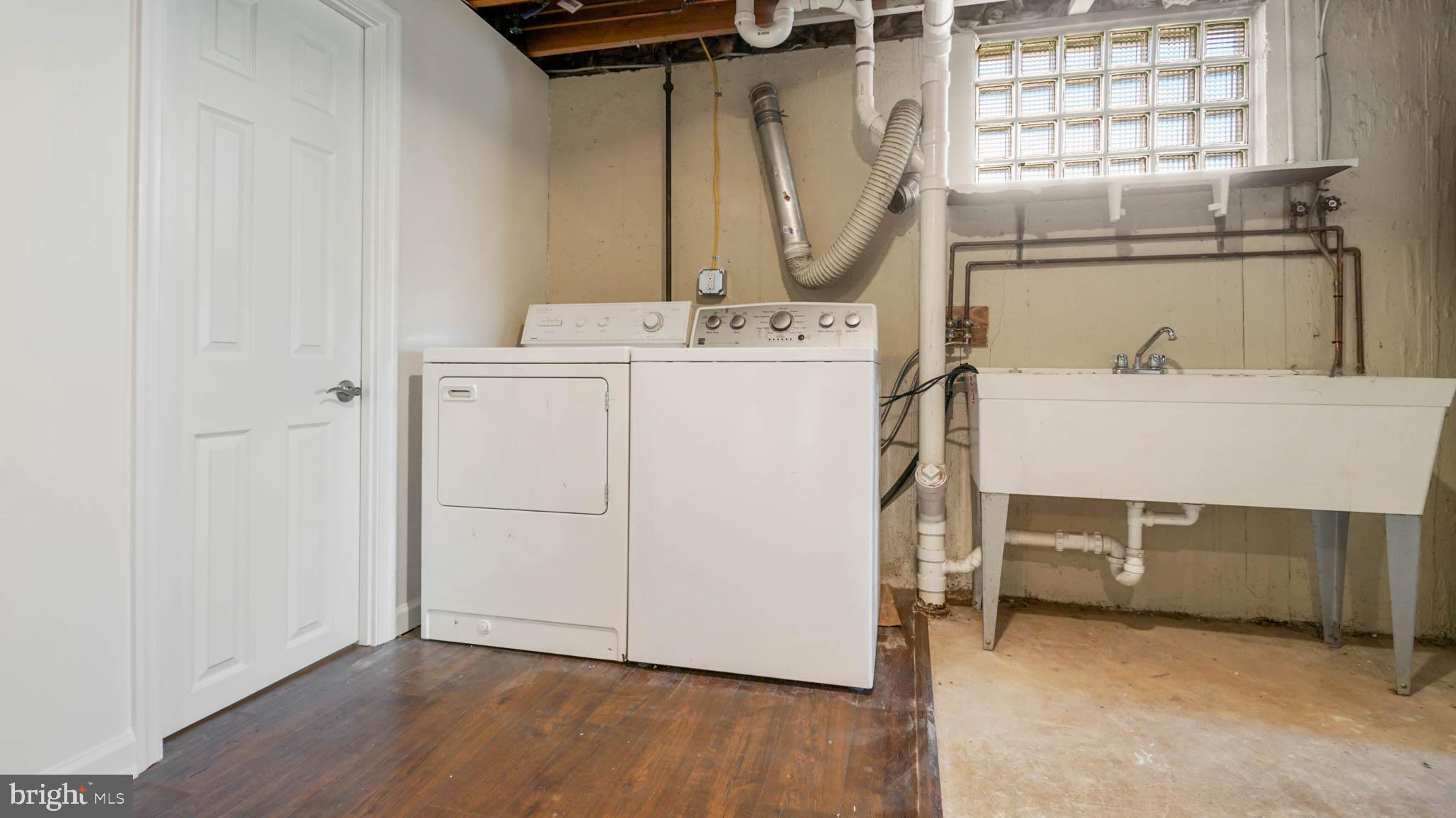 1523 National Road Baltimore, MD 21237 - Photo 21 of 26 Laundry WITH a double sanitary tub.
