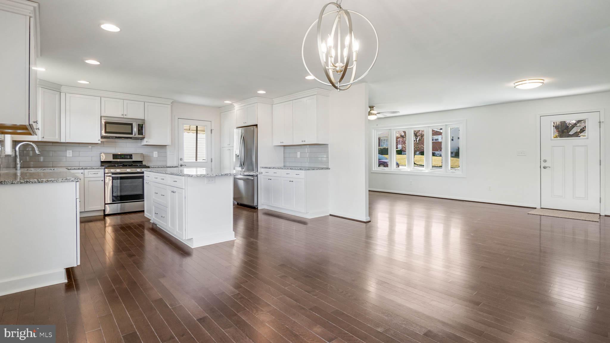 1523 National Road Baltimore, MD 21237 - Photo 6 of 26 Kitchen is open to the dining area.