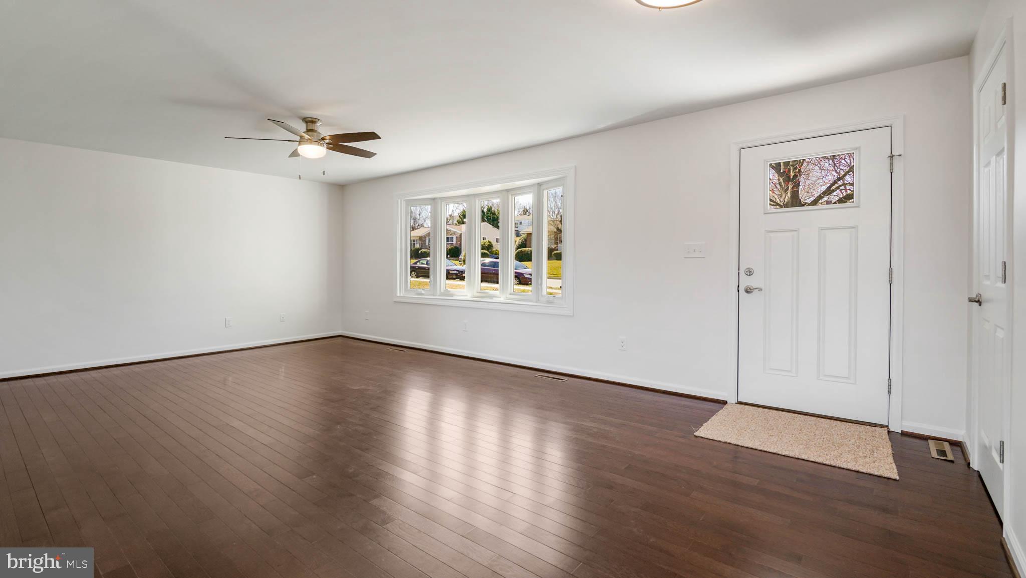 1523 National Road Baltimore, MD 21237 - Photo 8 of 26 Foyer open to family room.