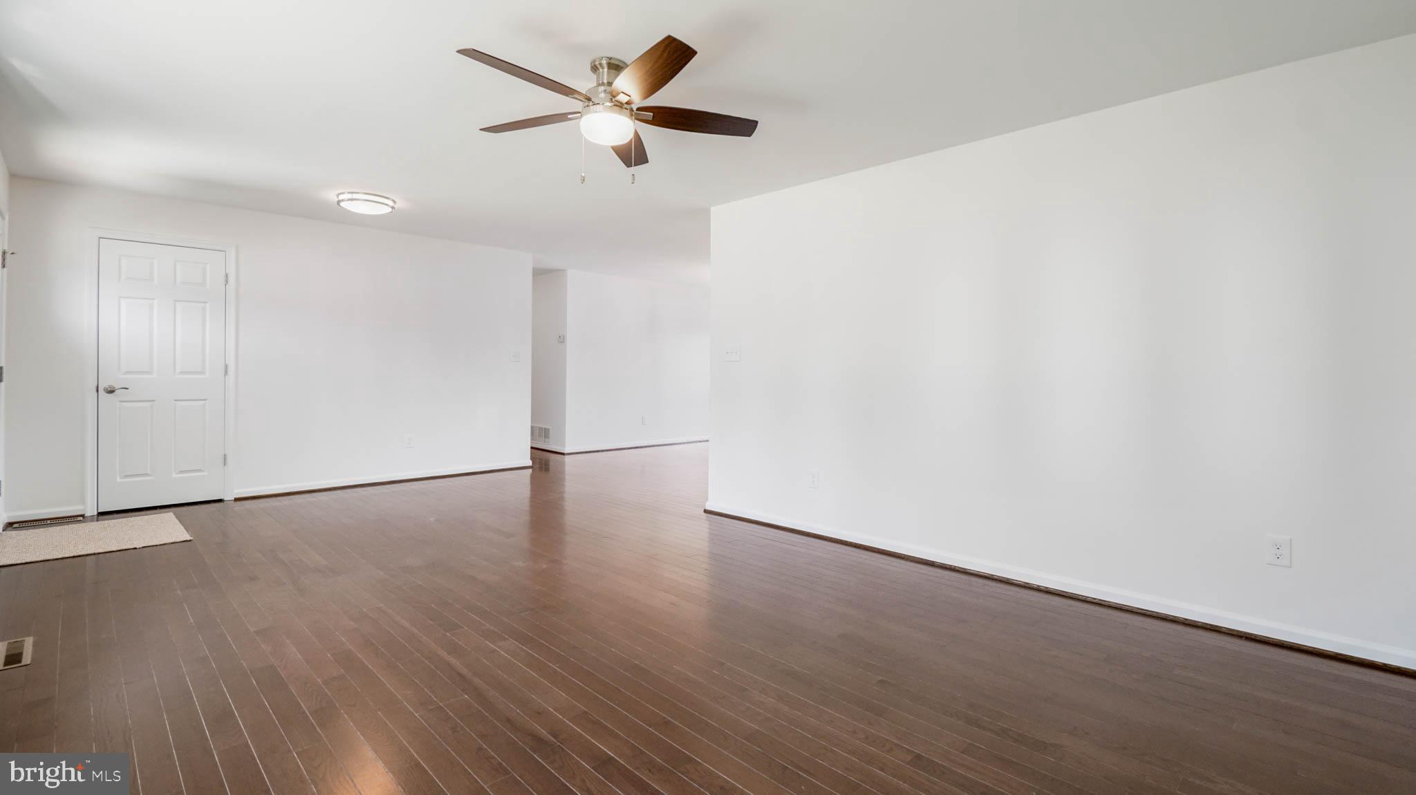 1523 National Road Baltimore, MD 21237 - Photo 10 of 26 Appointed with center lighting and ceiling fan.
