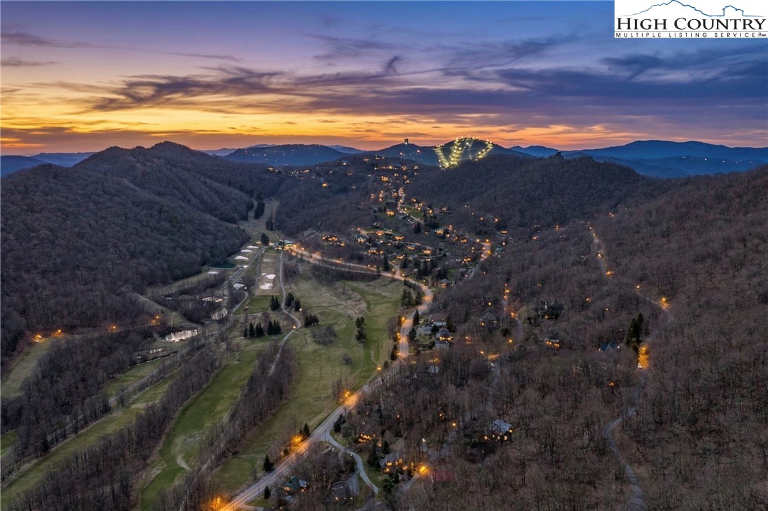 431 Cliffside Lane Seven Devils, NC 28604 - Photo 3 of 46 a view of lake and mountain