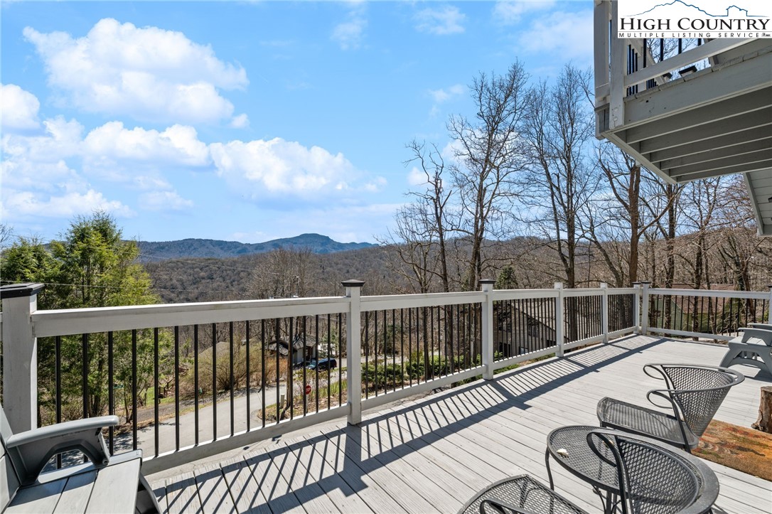 431 Cliffside Lane Seven Devils, NC 28604 - Photo 36 of 46 a view of a balcony with couch