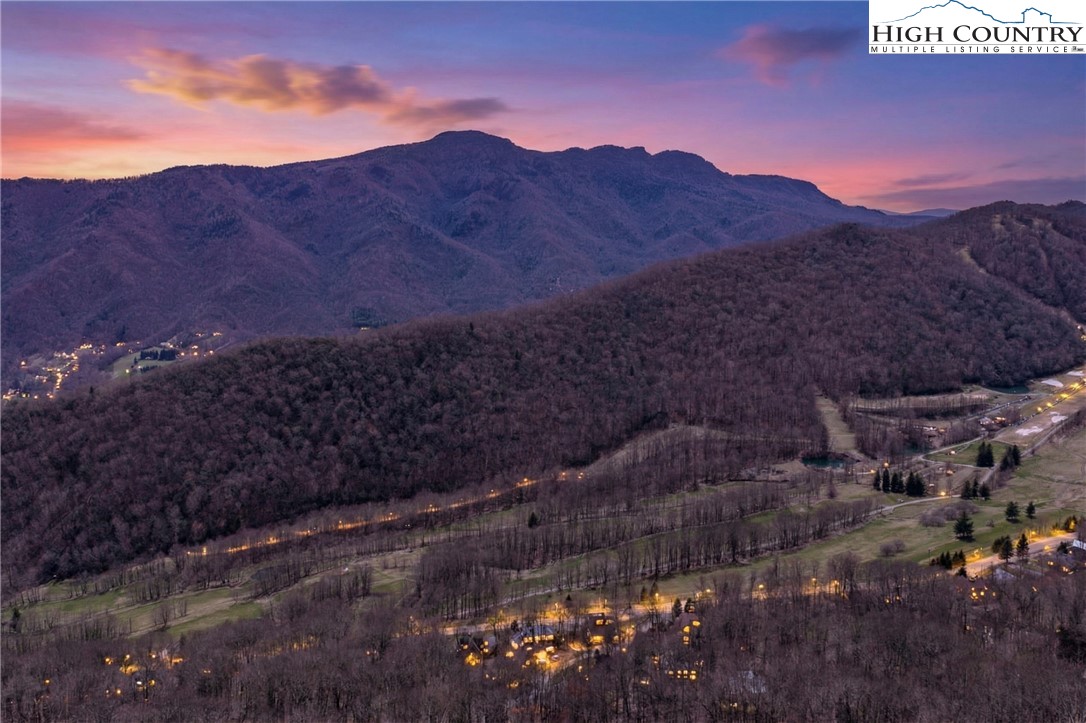 431 Cliffside Lane Seven Devils, NC 28604 - Photo 4 of 46 a view of a house with a mountain and a forest
