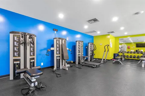 a view of a room with gym equipment