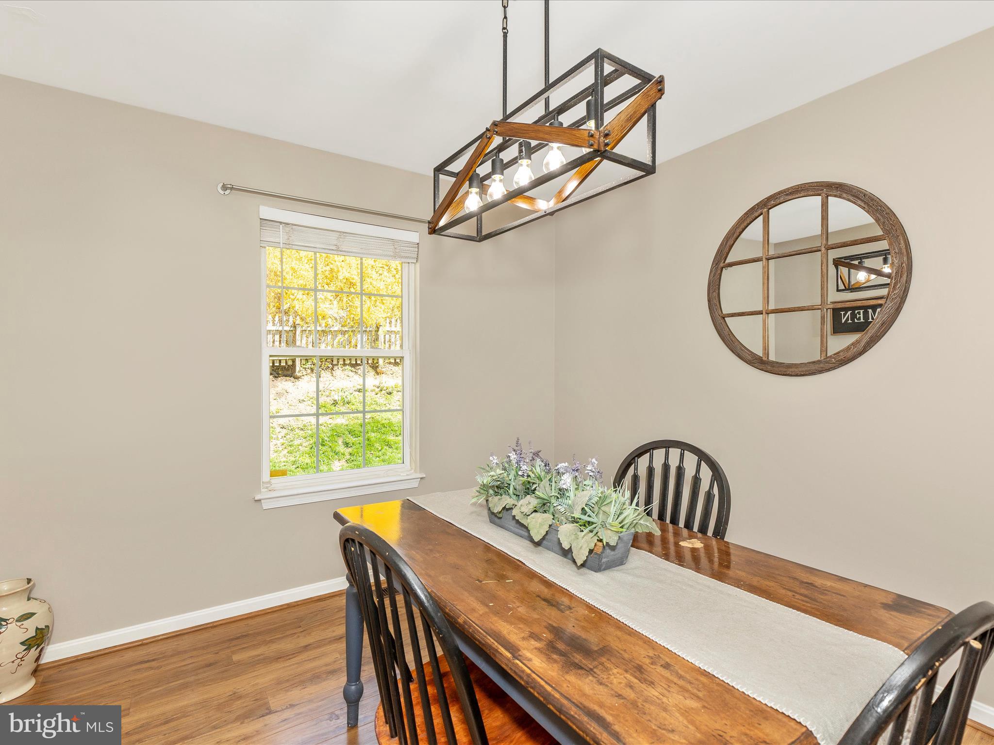 3935 Brittany Lane Hampstead, MD 21074 - Photo 12 of 55 a view of a dining room with furniture and a chandelier