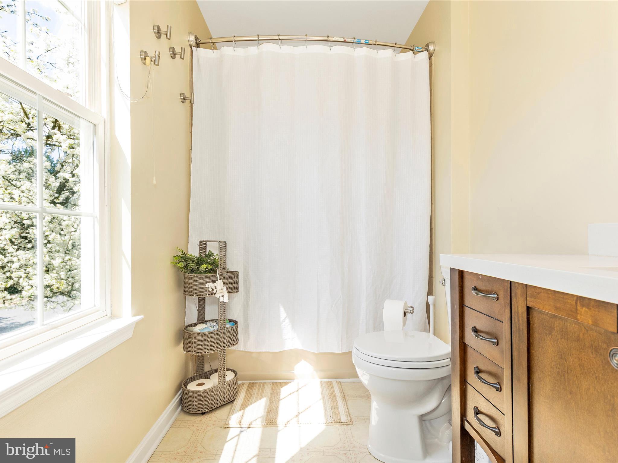 3935 Brittany Lane Hampstead, MD 21074 - Photo 25 of 55 a bathroom with a sink toilet and shower