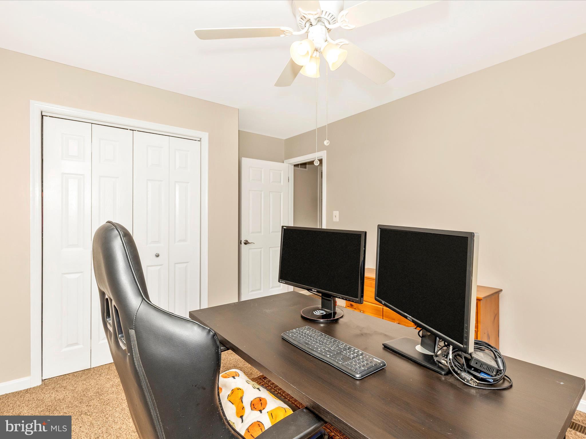 3935 Brittany Lane Hampstead, MD 21074 - Photo 30 of 55 a view of a workspace with furniture and a window