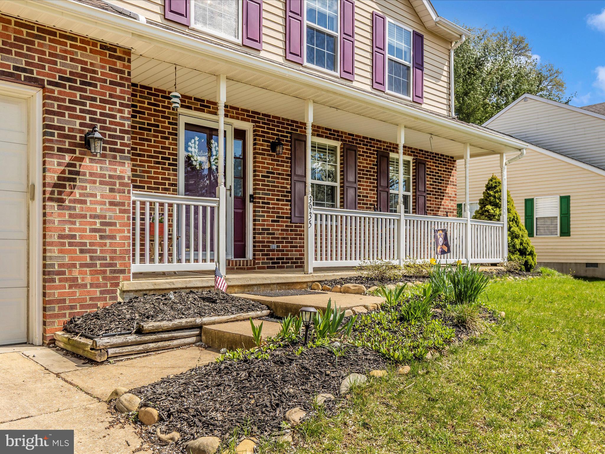 3935 Brittany Lane Hampstead, MD 21074 - Photo 42 of 55 a front view of a house with a yard