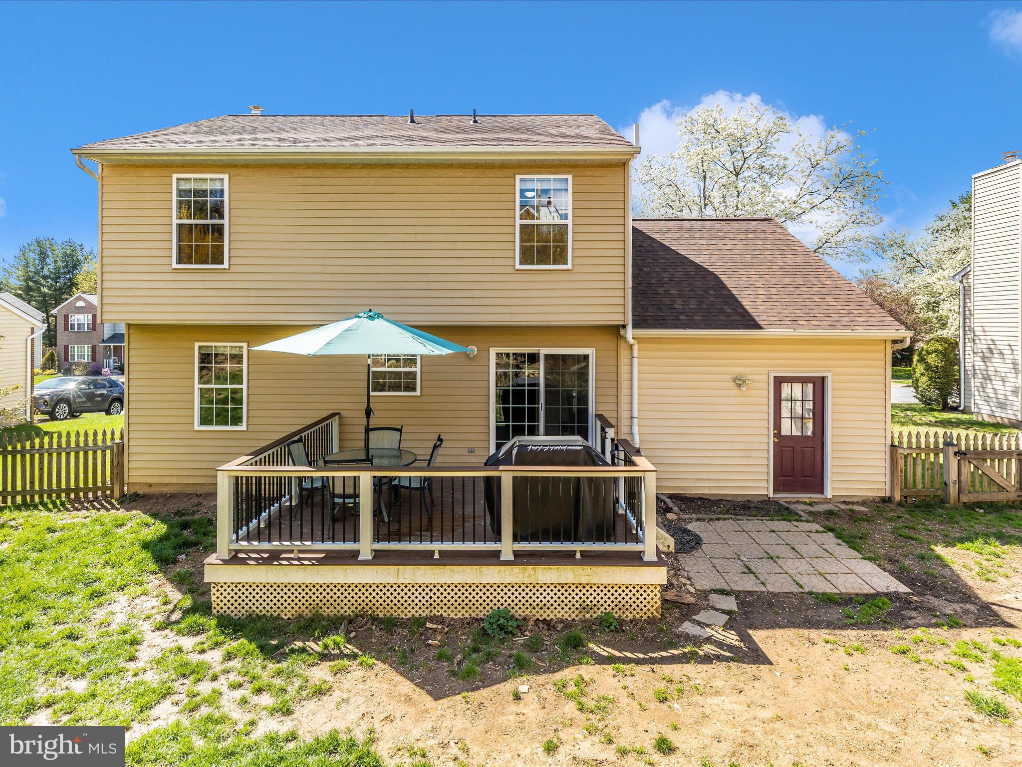 3935 Brittany Lane Hampstead, MD 21074 - Photo 48 of 55 a view of a house with a small yard and wooden fence