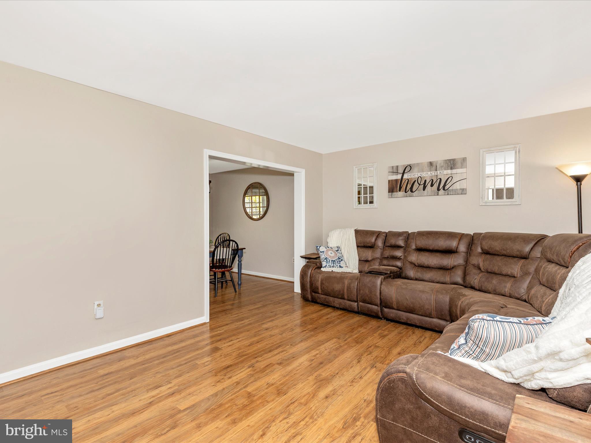 3935 Brittany Lane Hampstead, MD 21074 - Photo 5 of 55 a view of a livingroom with furniture and wooden floor