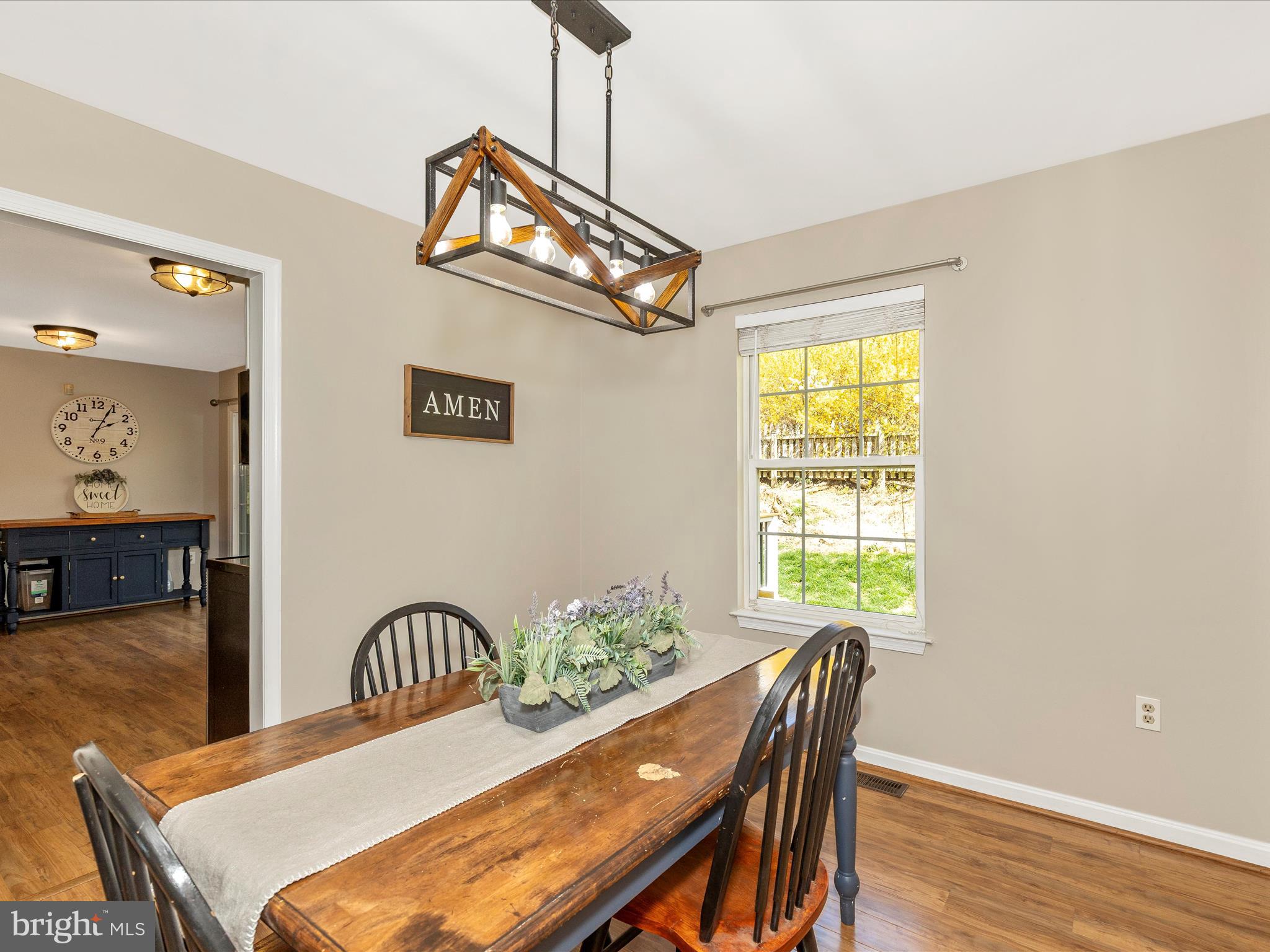 3935 Brittany Lane Hampstead, MD 21074 - Photo 10 of 55 a view of a dining room with furniture window and wooden floor