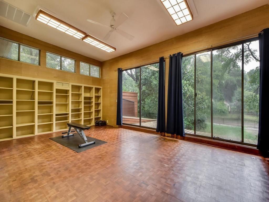 800 Leonard Street Austin, TX 78705 - Photo 12 of 31 a view of a livingroom with a floor to ceiling window and floor to ceiling window