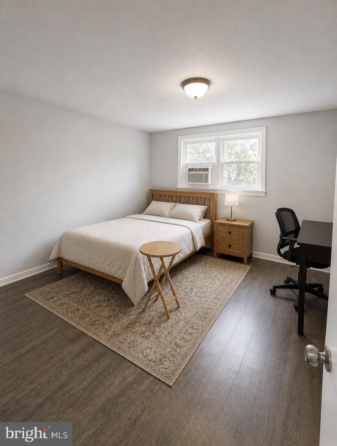 3129 Comly Road Philadelphia, PA 19154 - Photo 5 of 7 a bedroom with a bed and a window