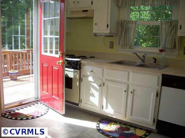 13602 Danwoods Road Midlothian, VA 23113 - Photo 4 of 10 Other - Kitchen opens to deck. Great flow for cookouts & entertaining. View of wooded setting outdoors from window.