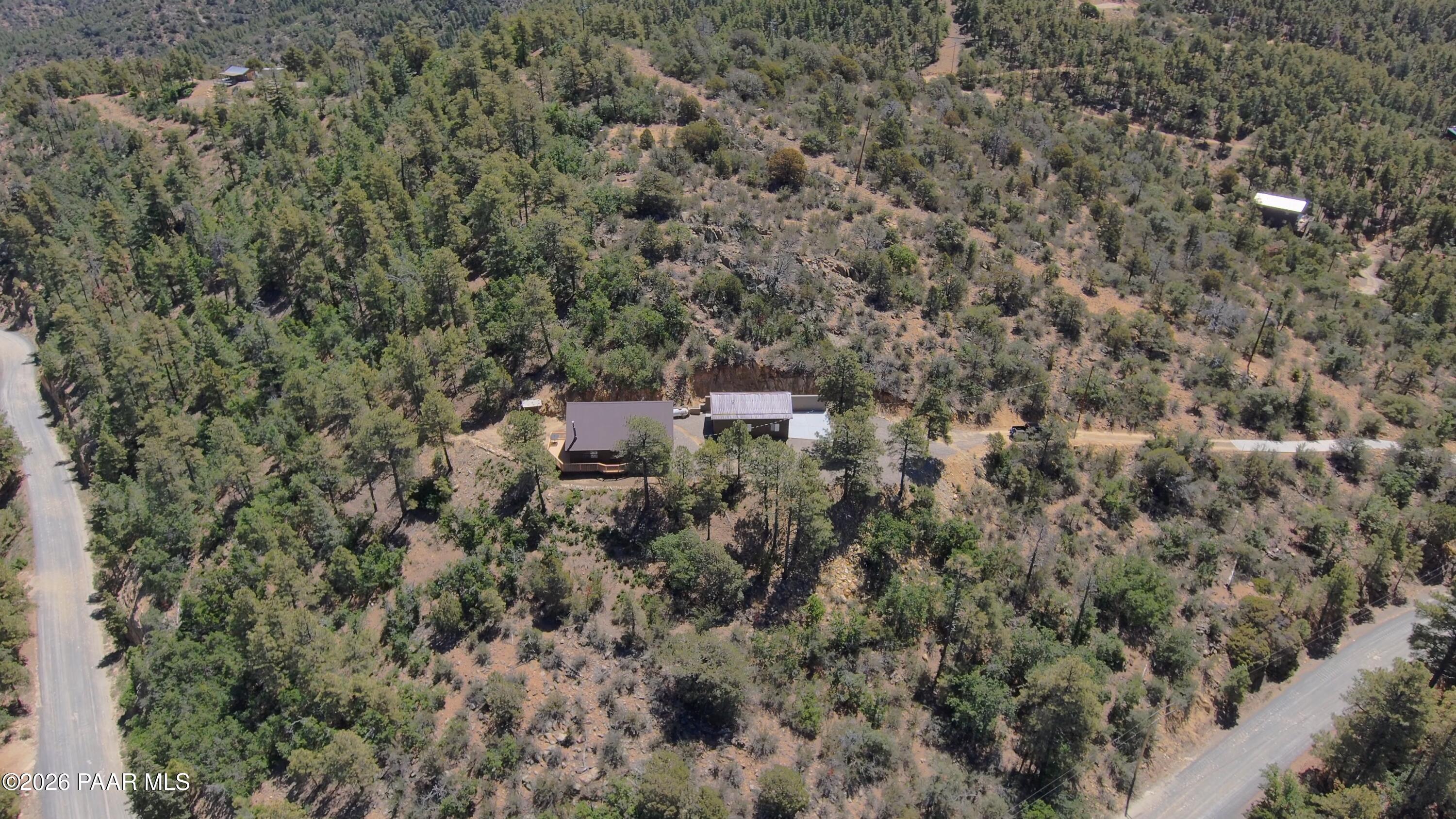 7251 South Big Bug Mesa Road Mayer, AZ 86333 - Photo 42 of 55 a view of a house with a street and trees