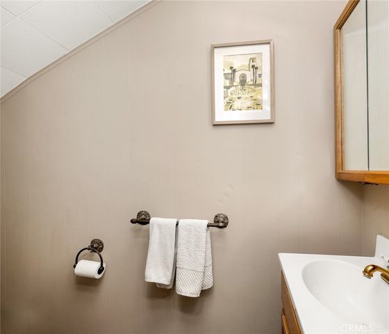 a bathroom with a white tub and a shower curtain