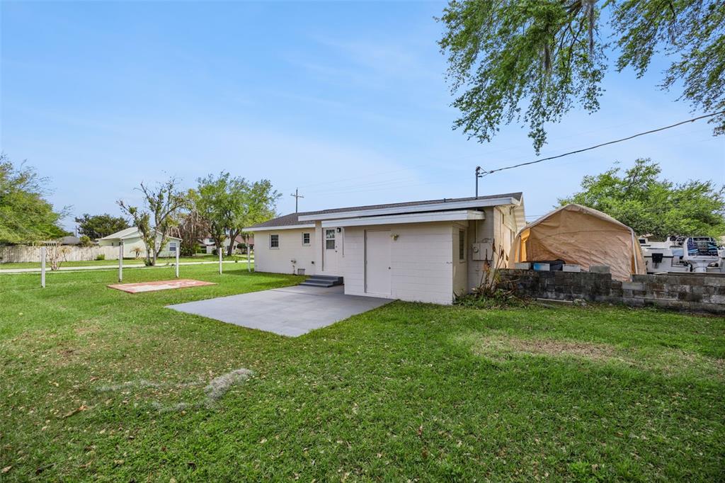 700 9th Street St. Cloud, FL 34769 - Photo 47 of 78 a view of a yard in front of house