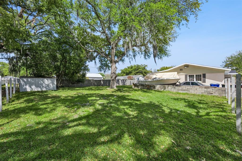 700 9th Street St. Cloud, FL 34769 - Photo 54 of 78 a view of a house with a big yard