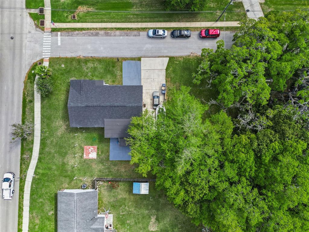 700 9th Street St. Cloud, FL 34769 - Photo 59 of 78 an aerial view of a house with yard